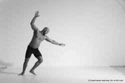 Underwear Gymnastic poses Man Black Muscular Bald Dancing Dynamic poses Academic